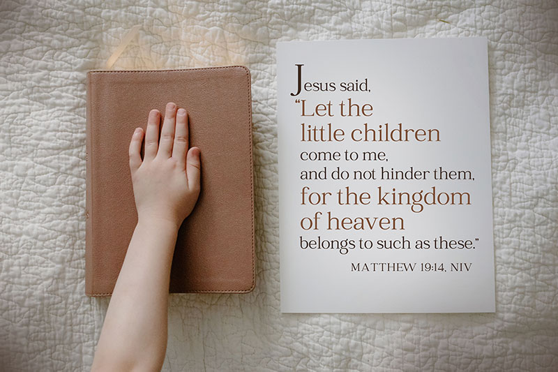 child had resting on bible